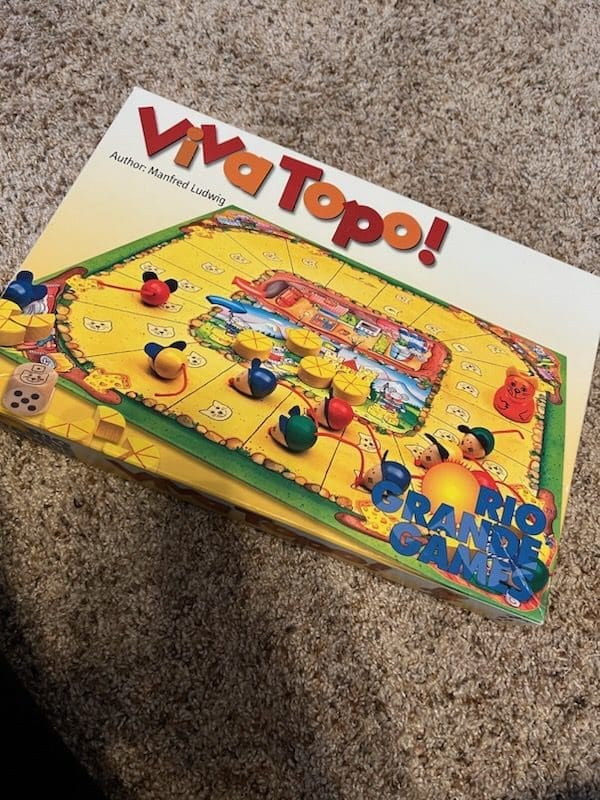 Viva Topo board game box sitting on carpeted floor